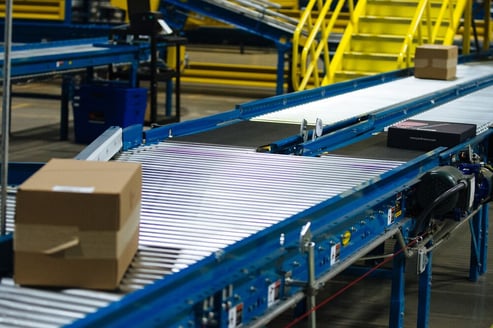 Hytrol conveyors merging into one line.